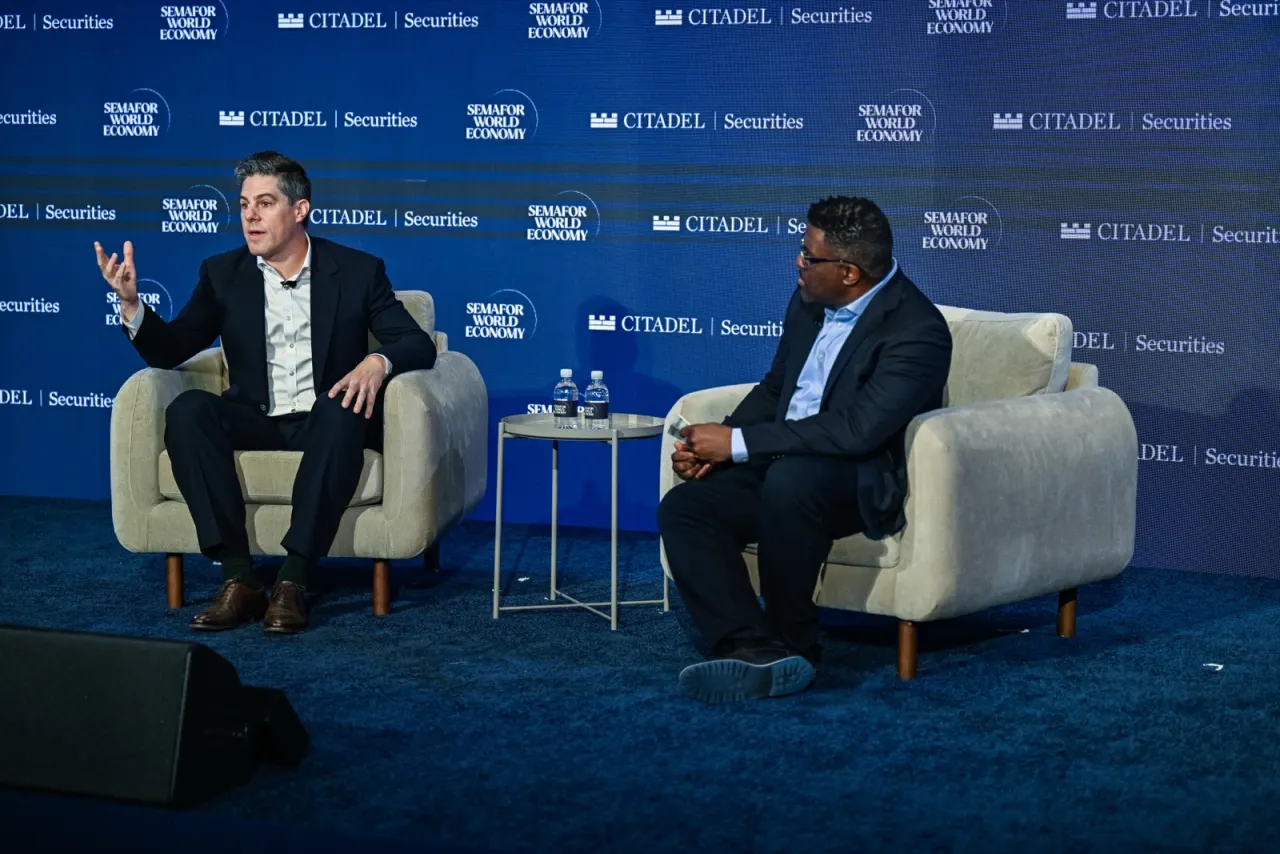 Jason Trost on stage with Yinka Adegoke at Semafor World Economy 2026