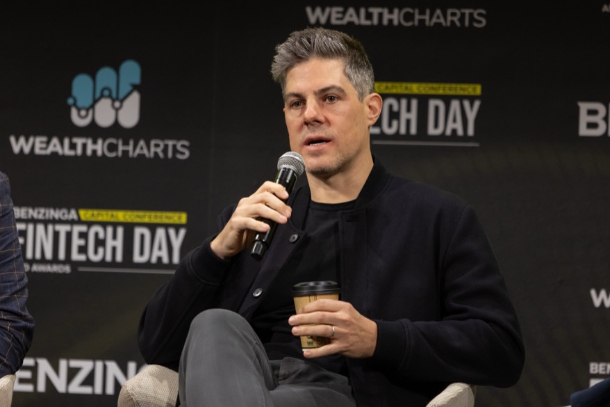 Jason Trost speaking on a panel at Benzinga Fintech Day 2025 in New York City